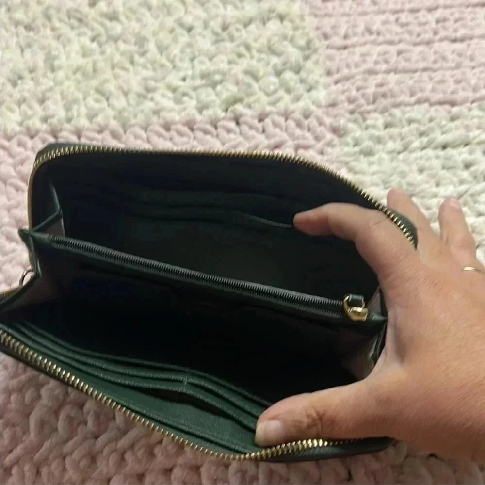 - Michael Kors green large wallet